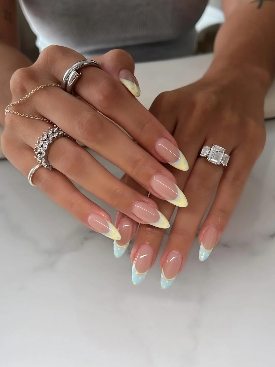 summer dip nails 2026 Pastel Yellow And Blue Almond French Tips