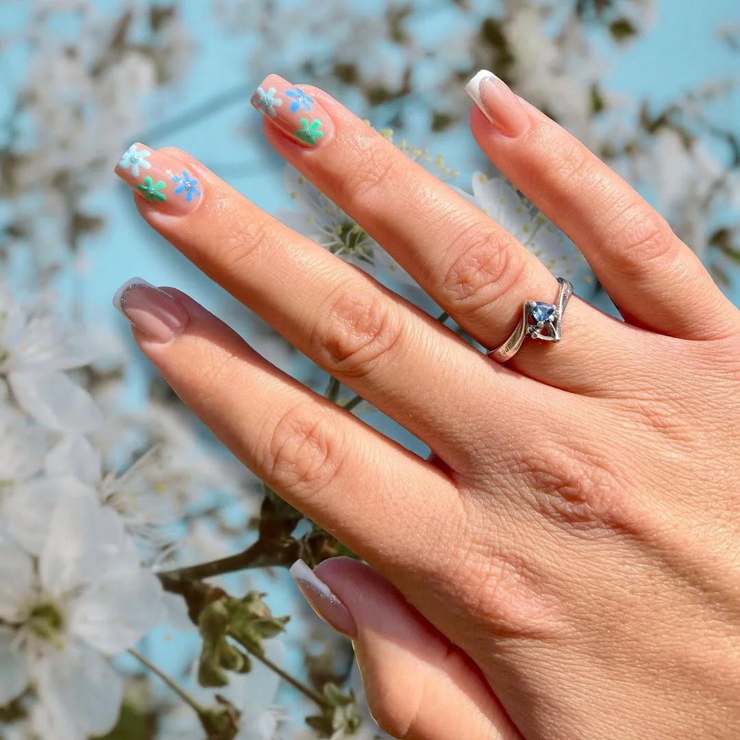 summer flower nails 2026 Sheer Floral French With Blue And Green Petals
