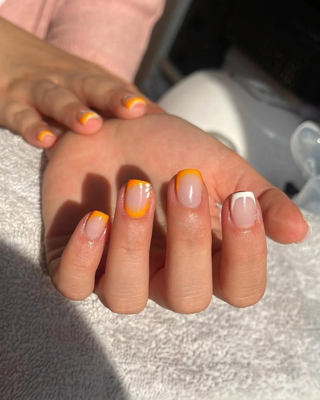 summer flower nails 2026 Short Orange French Tips With A Clean Summer Glow
