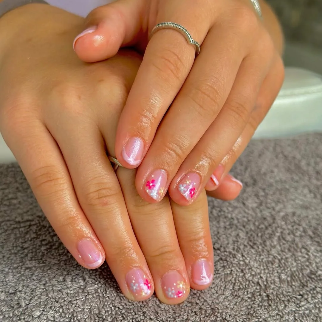 summer flower nails 2026 Tiny Pink And White Flowers On Sheer Short Nails