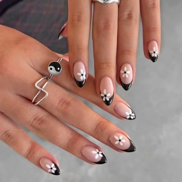 summer flower nails 2026 Black French Tips With White Daisy Accents