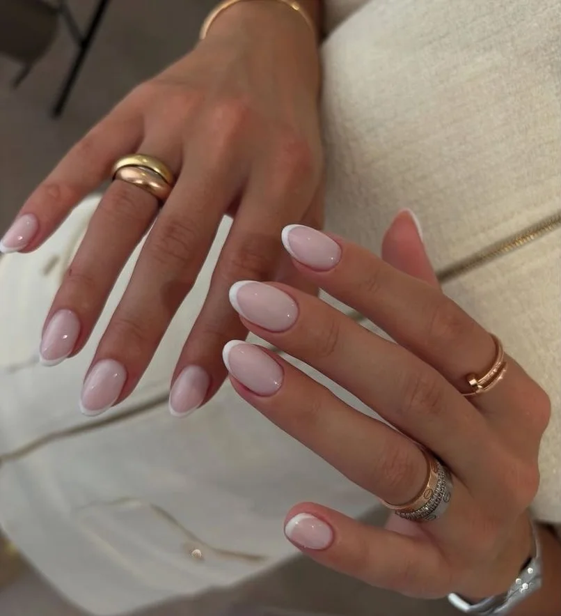 summer french nails ideas 2026 Milky Almond French With A Soft White Outline