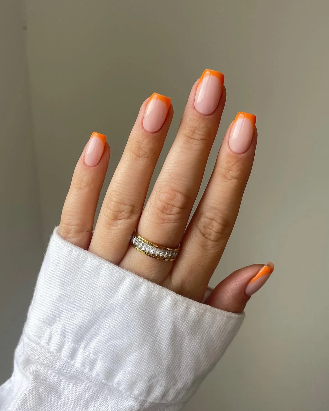 summer french tip nails 2026 Bright Orange French Tips On A Soft Square Shape