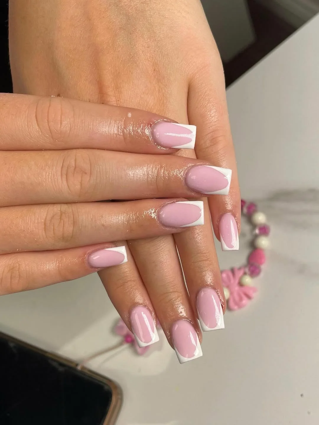summer french tip nails 2026 Bold White French Tips With A Pink Gloss Base