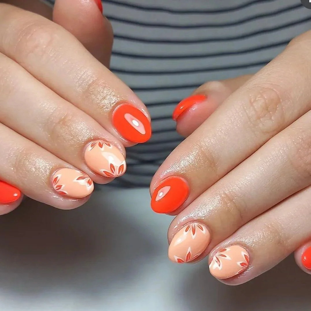 summer gel nails 2026 Citrus Orange Gel Nails With Soft Floral Accents