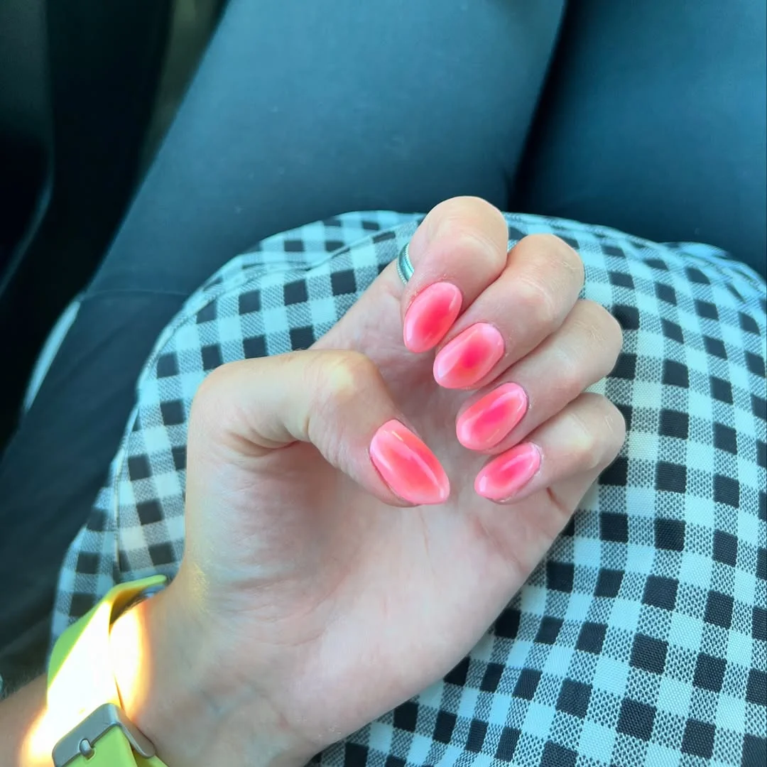 summer gel nails 2026 Coral Jelly Almond Nails With A Soft Glow