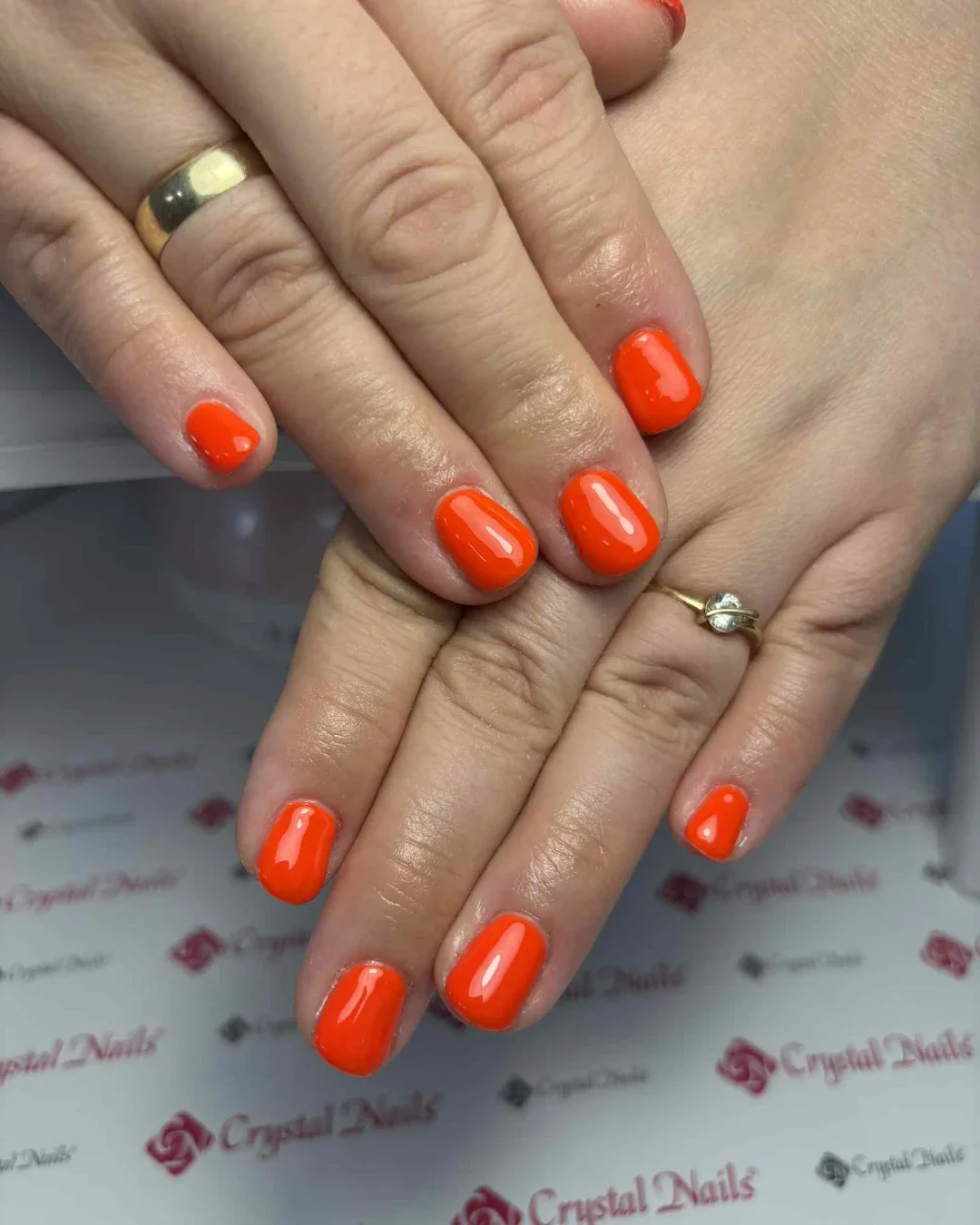 summer gel nails 2026 Glossy Orange Short Gel Nails For Instant Summer Brightness