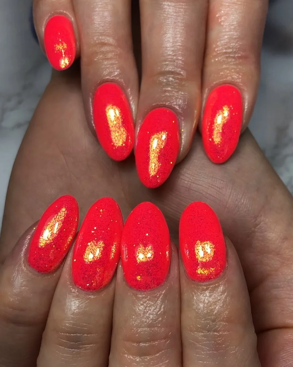 summer glitter nails 2026 Hot Red Almond Nails With Golden Sparkle