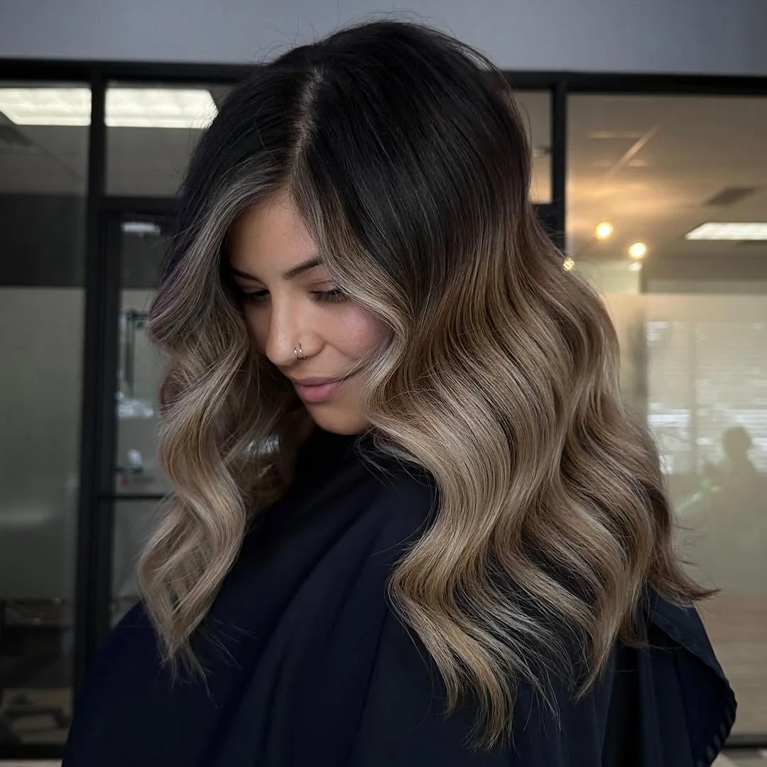 summer hair color ideas 2026 Smoky Root Melt With Sandy Blonde Waves
