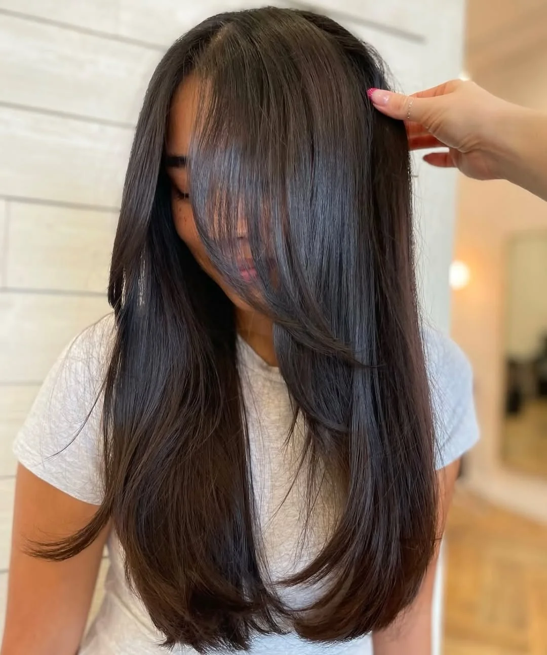 summer hair color ideas 2026 Glossy Blue Black Layers With A Sleek Finish