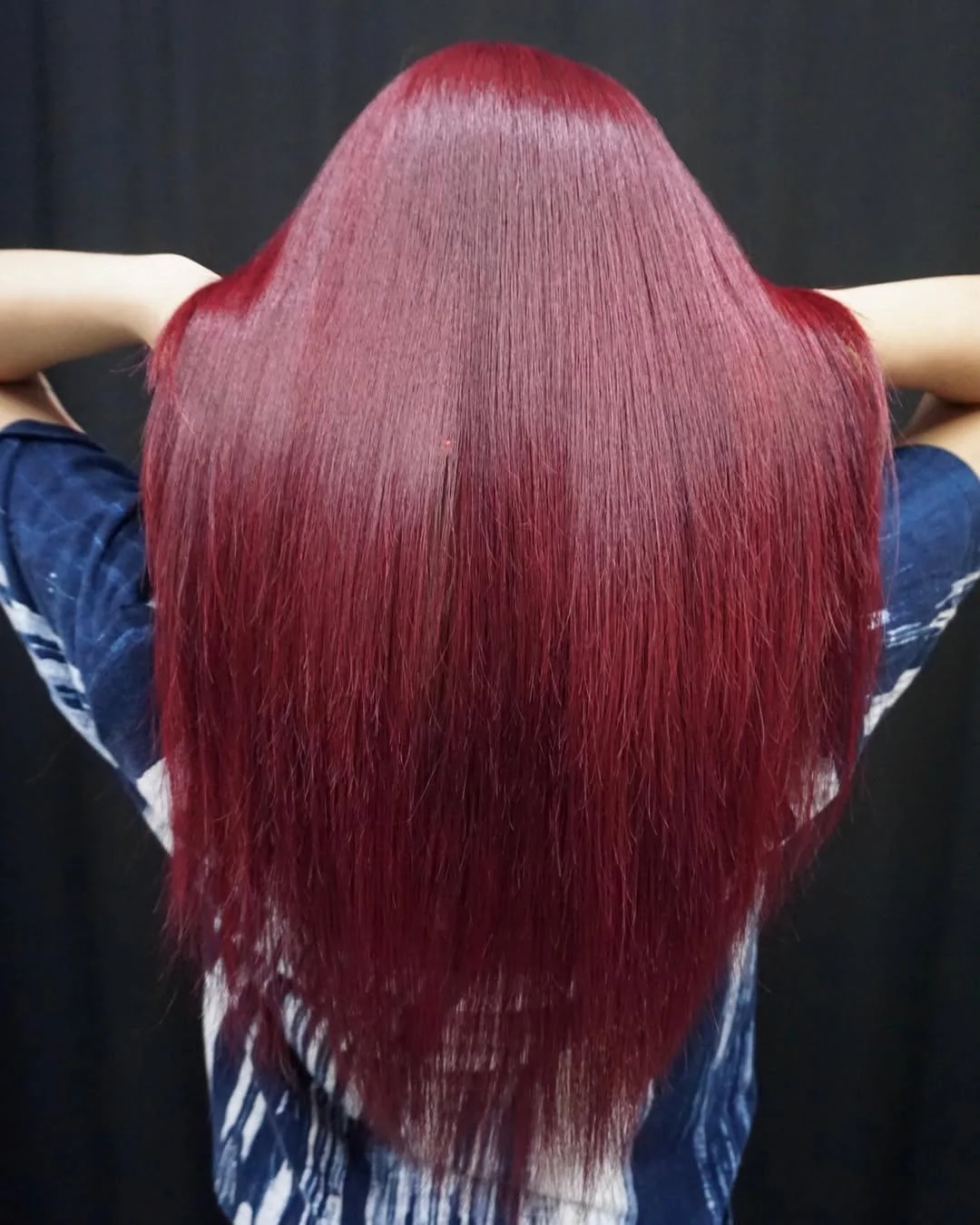 summer hair color ideas 2026 Deep Berry Red With A Sleek Glossy Finish