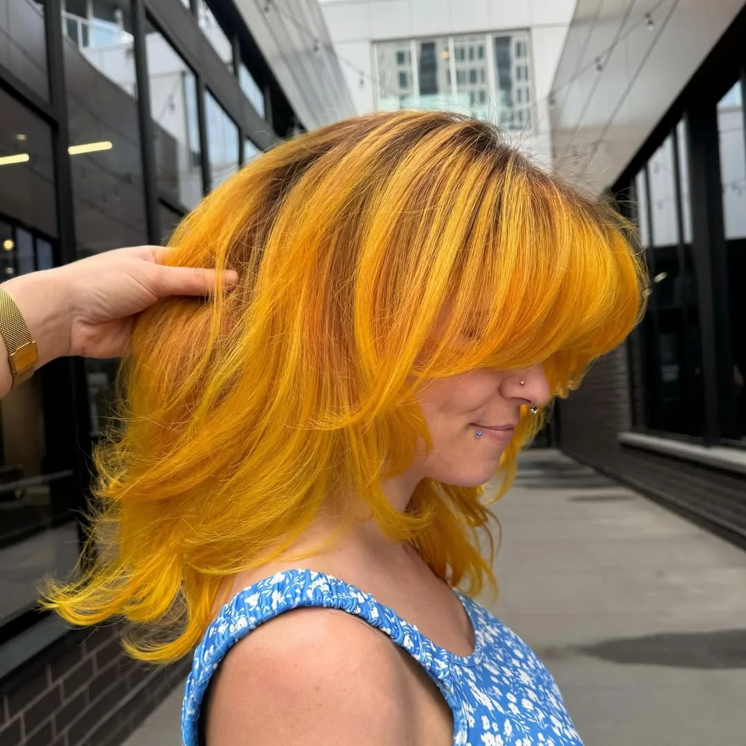 summer hair color ideas 2026 Electric Marigold Yellow With Feathered Summer Layers
