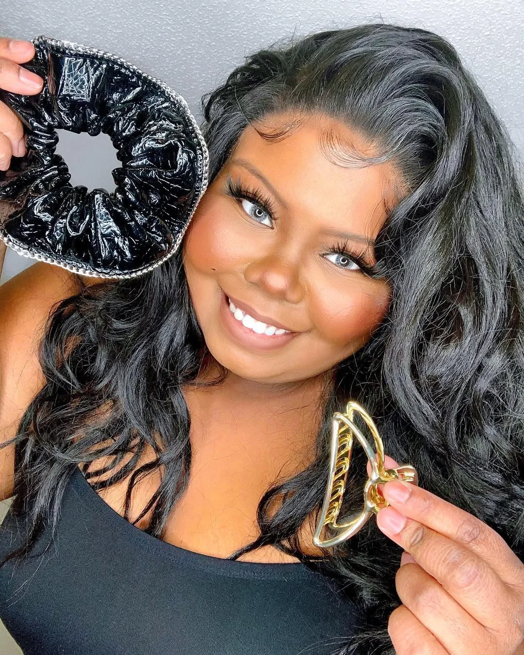 summer haircuts for plus size women 2026 Glossy Black Waves With Side-Swept Volume