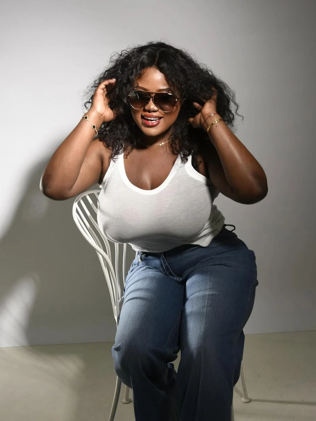 summer haircuts for plus size women Glossy Curly Volume With A Shoulder-Grazing Finish