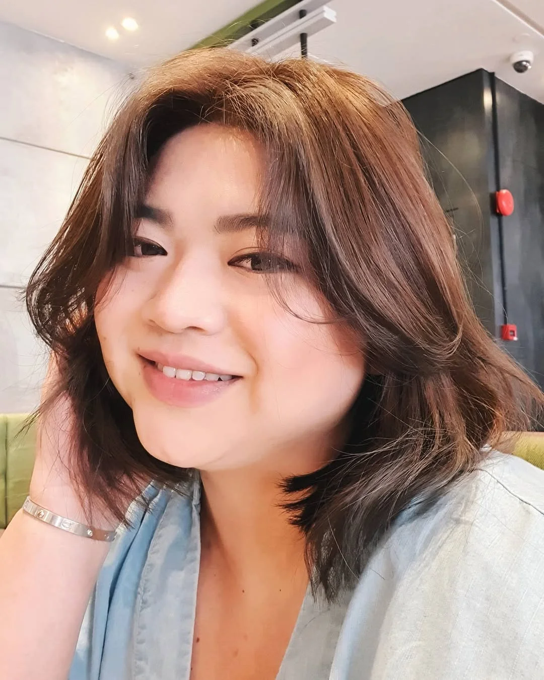 summer haircuts for plus size women 2026 Soft Caramel Length With A Smooth Center Part