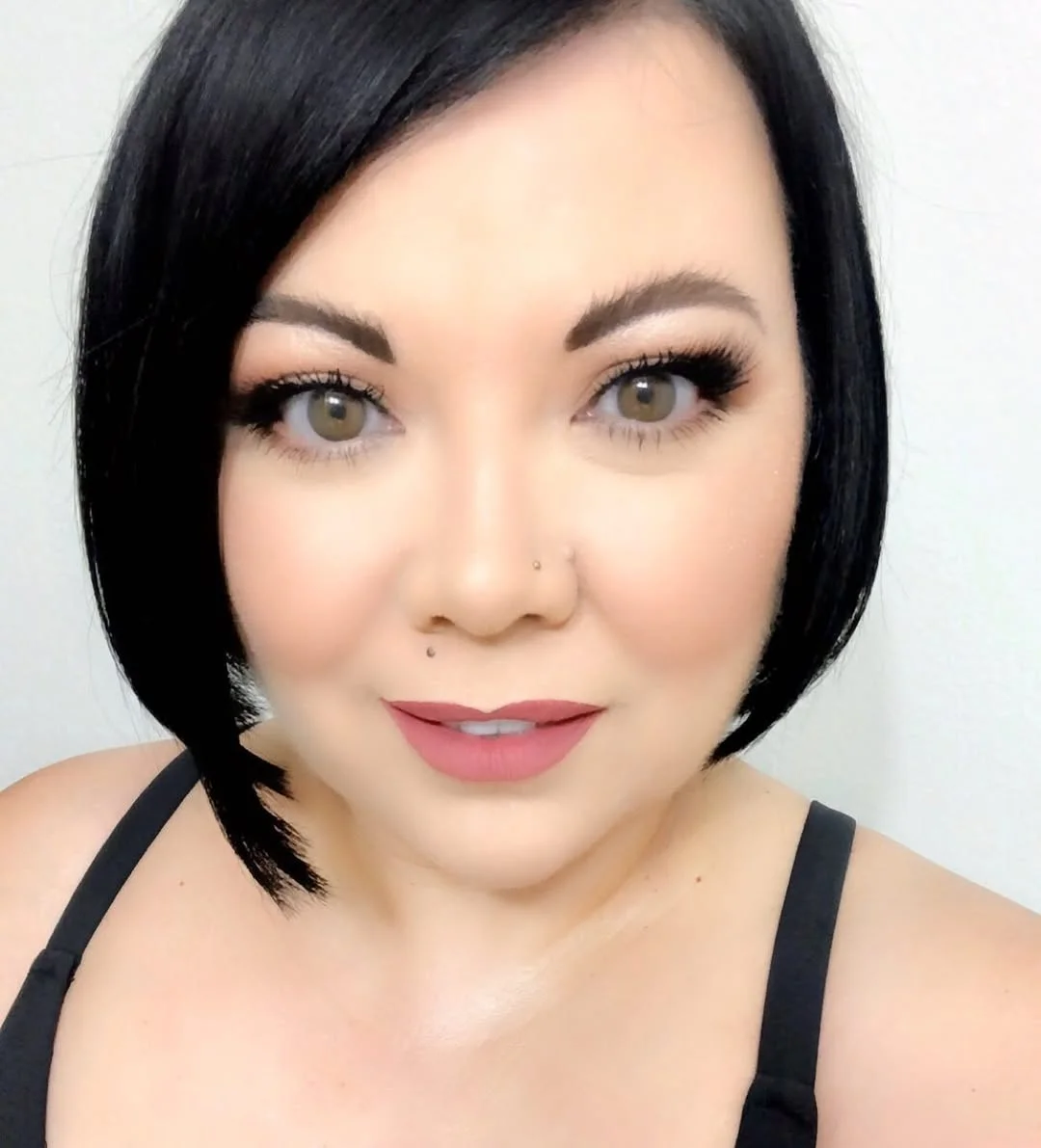 summer haircuts for plus size women Sharp Side-Part Bob With Glossy Black Drama