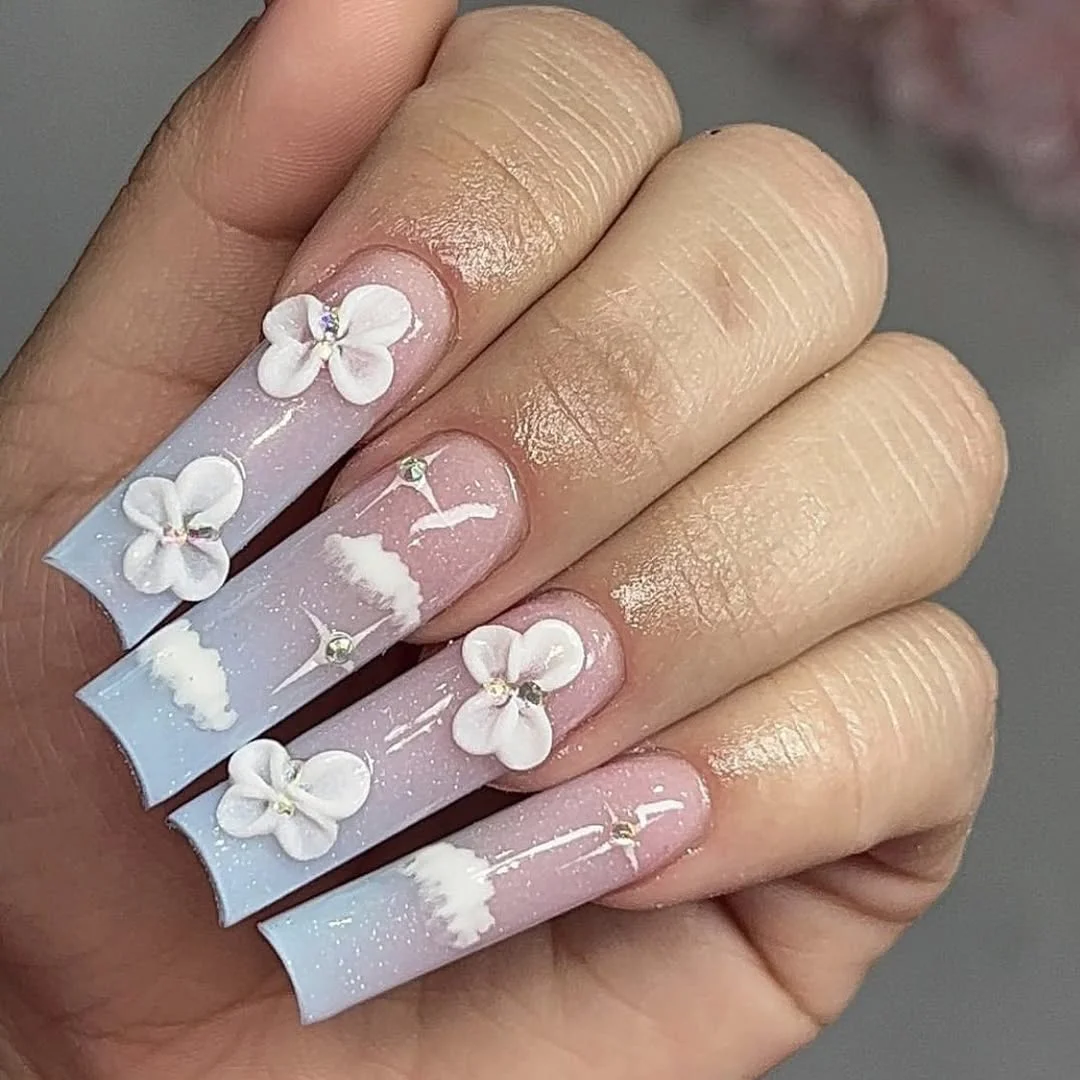 summer manicure color ideas 2026 Long Floral Acrylic Nails With Soft Blue Tips