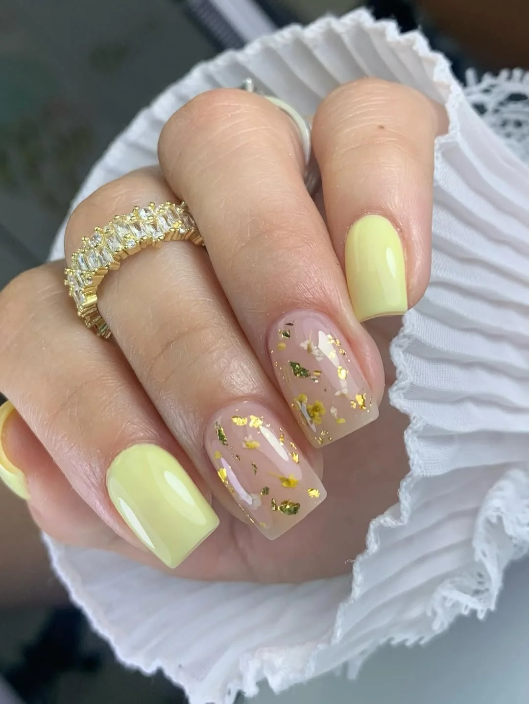 summer manicure color ideas 2026 Pale Yellow Nails With Gold Botanical Accents