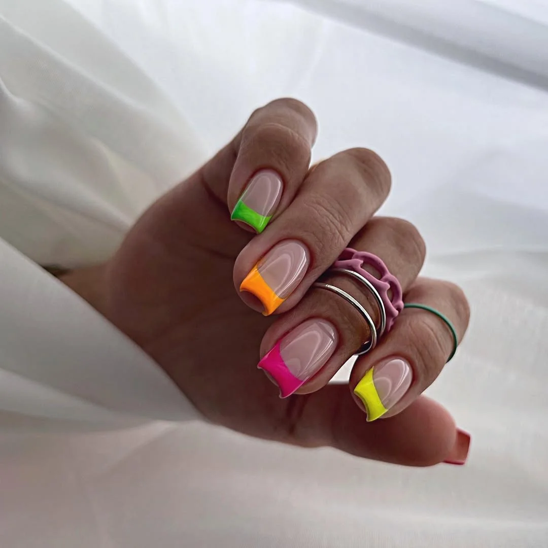 summer manicure color ideas 2026 Neon French Tips On A Soft Nude Base
