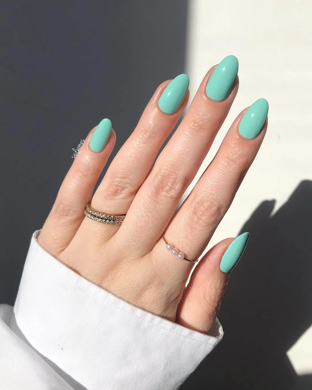 summer manicure color ideas 2026 Soft Mint Solid Almond Manicure