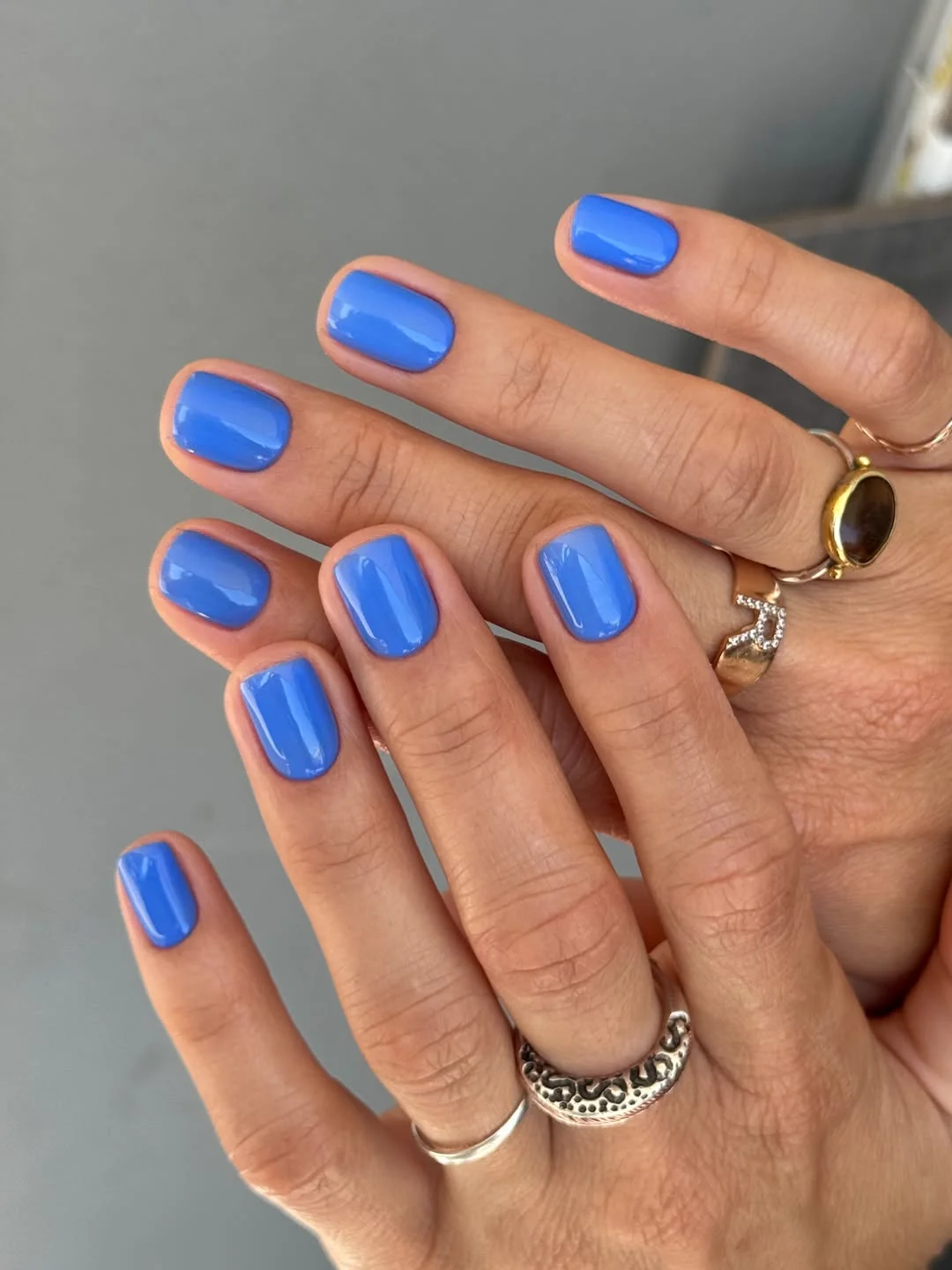 summer manicure color ideas 2026 Bright Blue Short Solid Summer Manicure