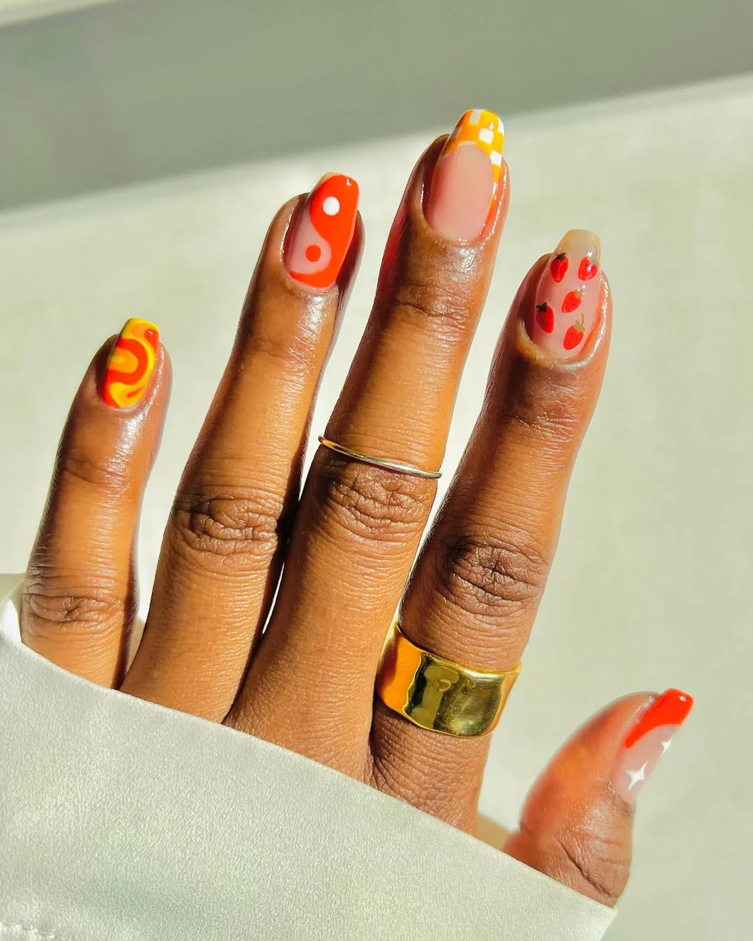 summer nail art 2026 Retro Fruit Nails With Orange Yellow And Strawberry Accents