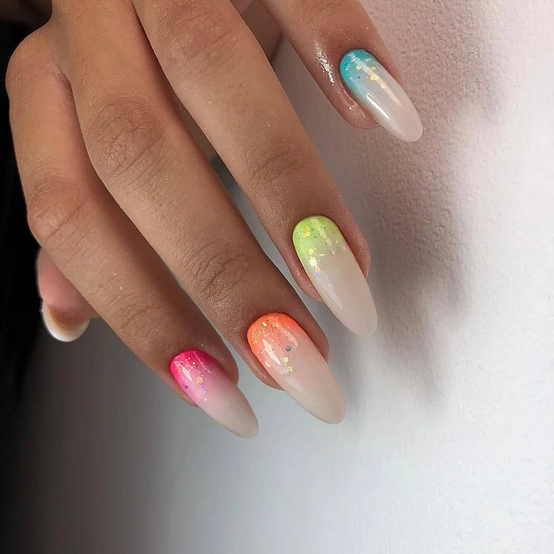 summer nail colors 2026 Milky Rainbow Ombre With Soft Glitter