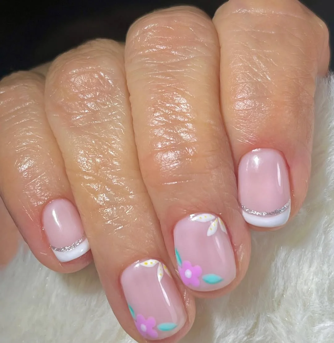 summer nail colors 2026 Soft Pink French With Tiny Floral Details
