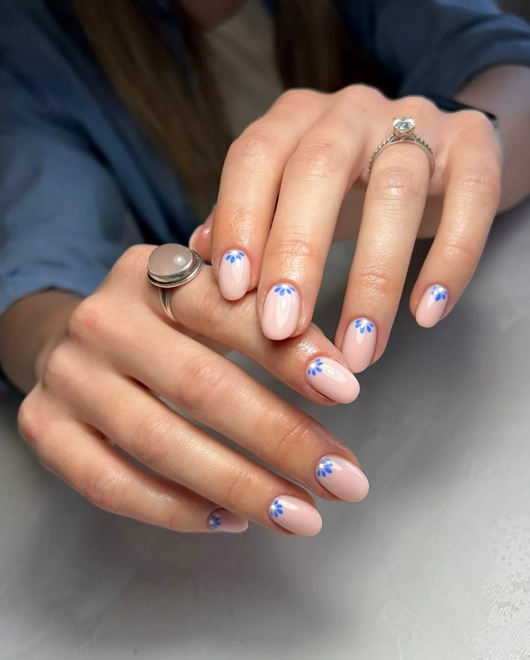 summer nail inspo 2026 Blush Pink Short Almond Nails With Minimal Blue Petals
