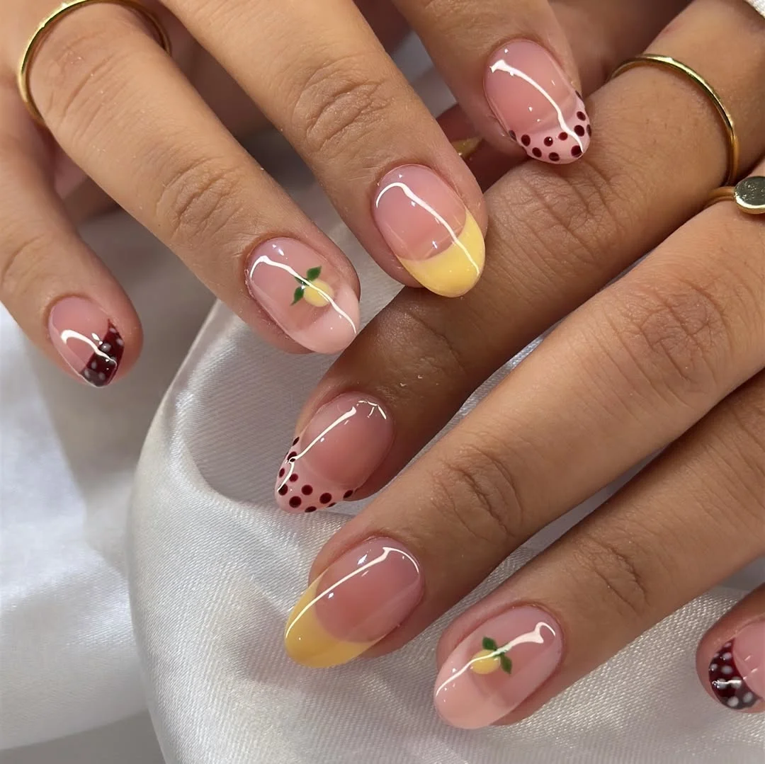 summer nail inspo 2026 Glossy Fruit French Nails With Cherry And Lemon Accents