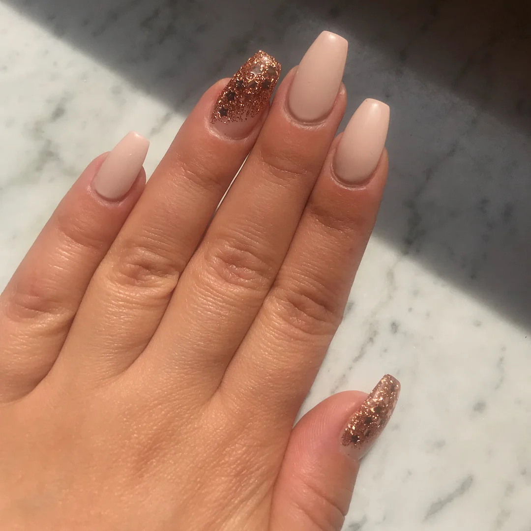 summer nails ballerina shape 2026 Blush Nude Ballerina Nails With Rose Gold Glitter Accents