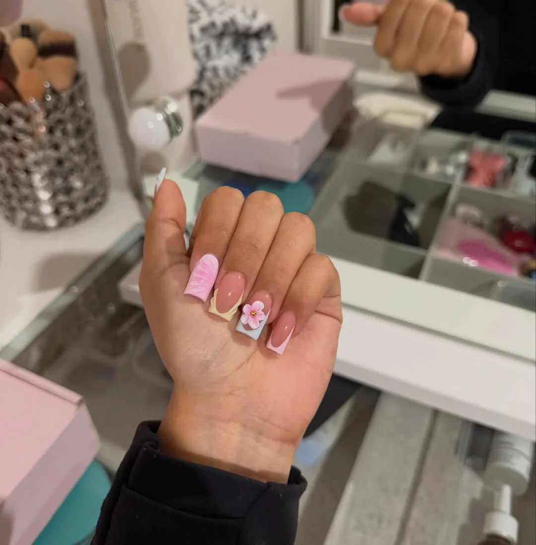 summer nails ballerina shape 2026 Pastel Ballerina Nails With Pink Waves And 3D Flower Accent