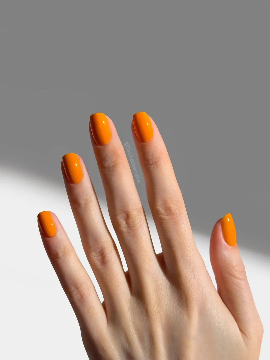 summer nails one color 2026 Glossy Tangerine Short Nails With Clean Summer Shine