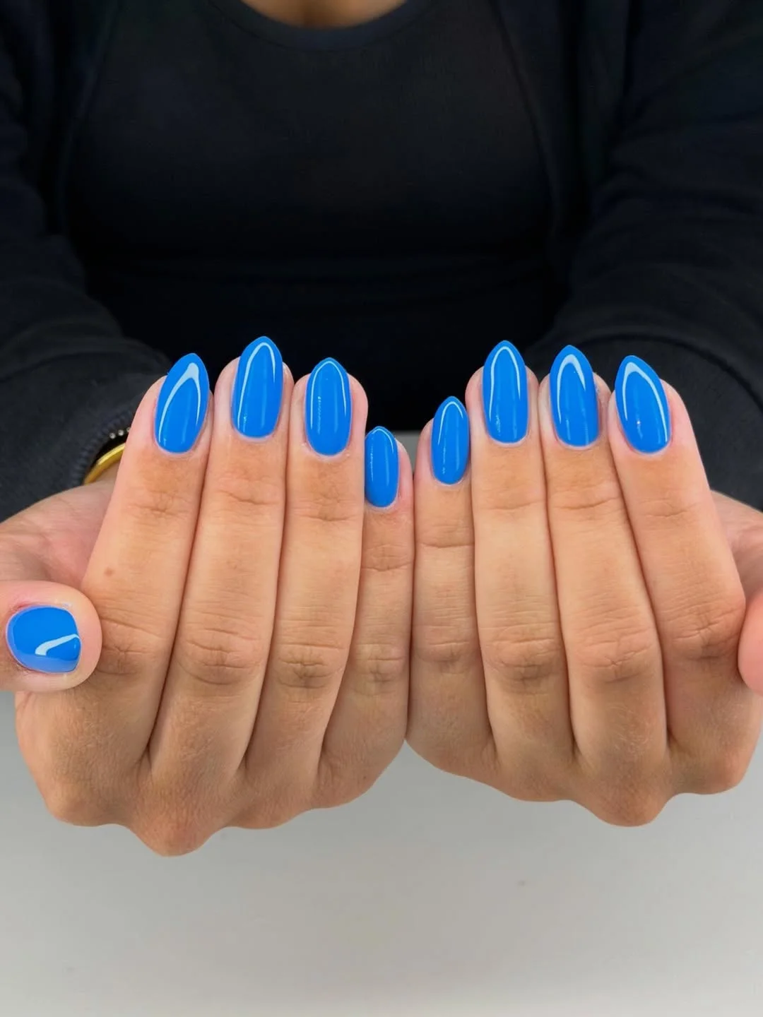 summer nails one color 2026 Electric Blue Almond Nails With Pool-Day Shine