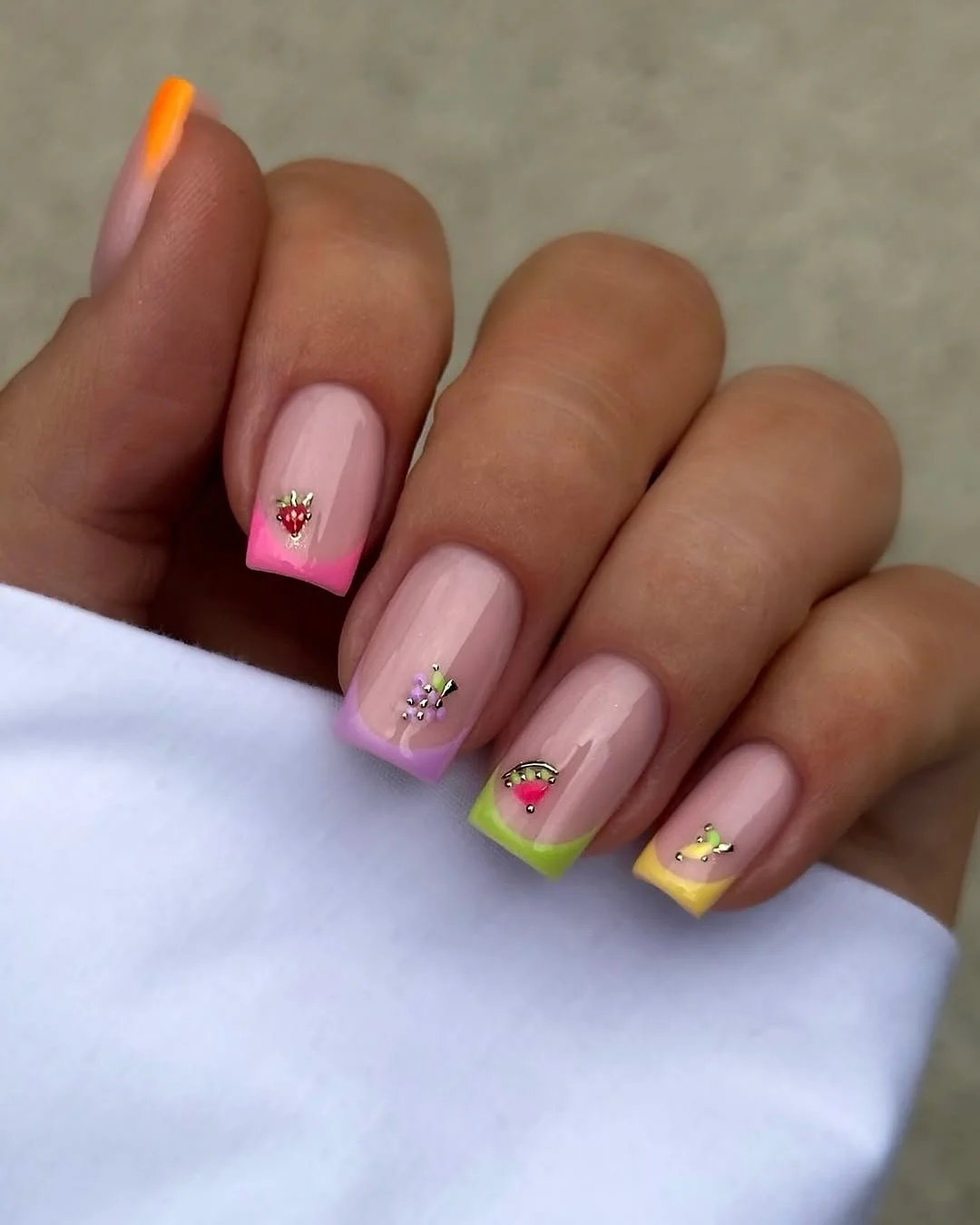 summer nails square 2026 Neon Fruit-Tip Square Nails With Tiny Gold Charms