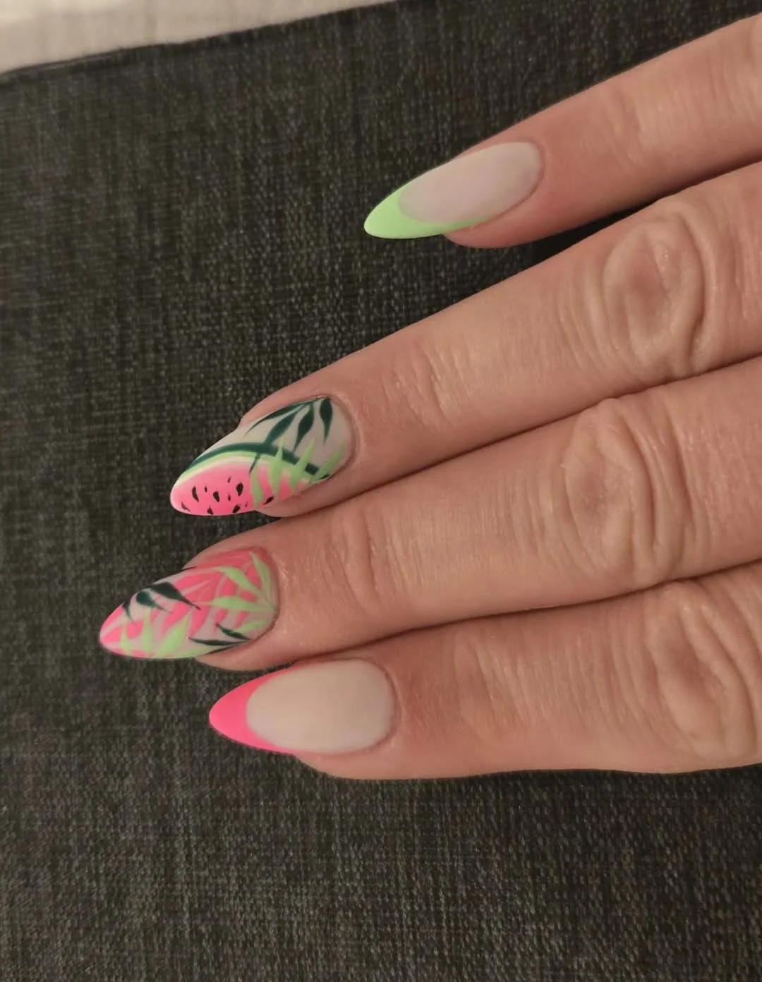 summer nails watermelon 2026 Soft Almond Watermelon Nails With Tropical Leaf Art