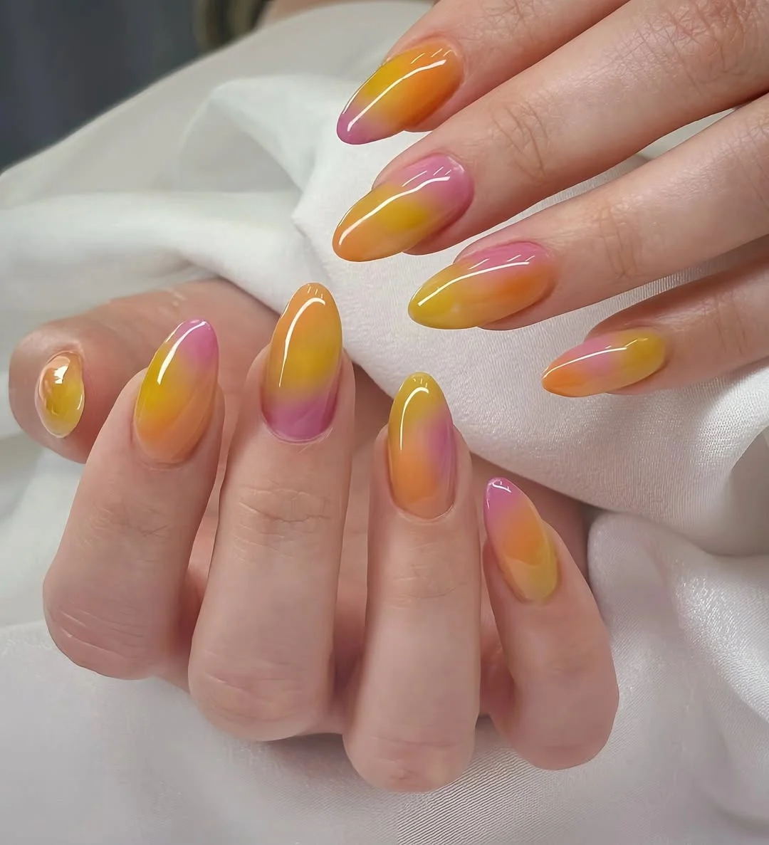 summer ombre nails 2026 Glossy Mango Pink Ombre Almond Nails