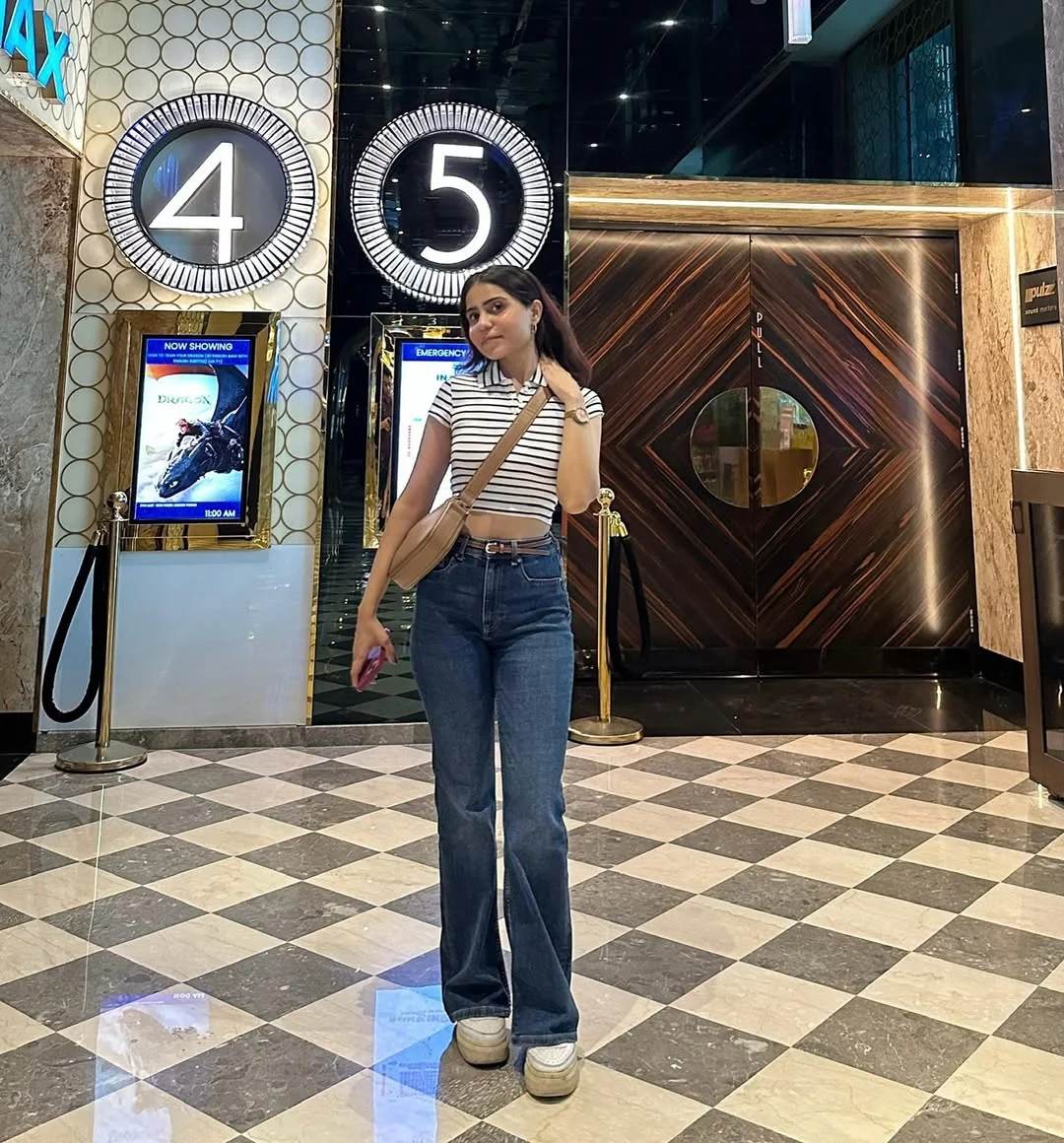 28 summer outfits for women 2026 Striped Polo And Flared Jeans For Preppy Movie-Night Energy