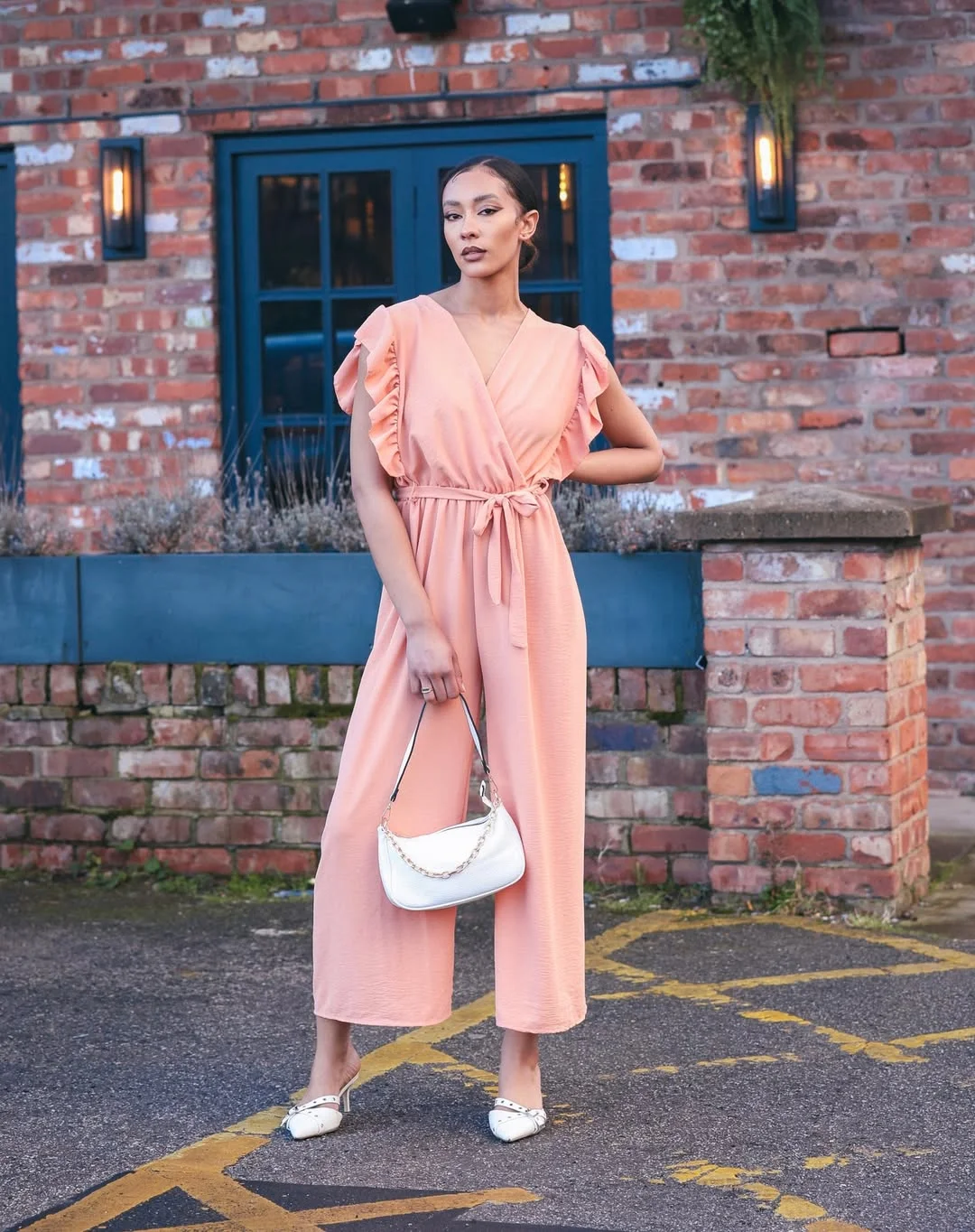 28 summer outfits for women 2026 Peach Wrap Jumpsuit With Soft Dressy Lines