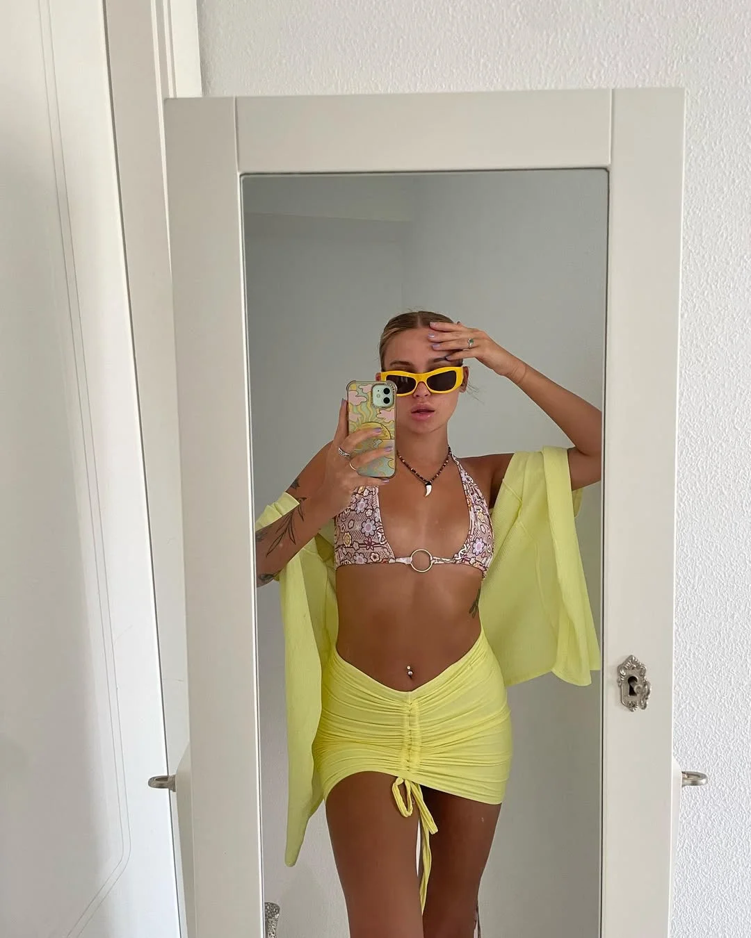 30 summer skirt outfits 2026 Lime Ruched Mini Skirt With A Floral Bikini Top