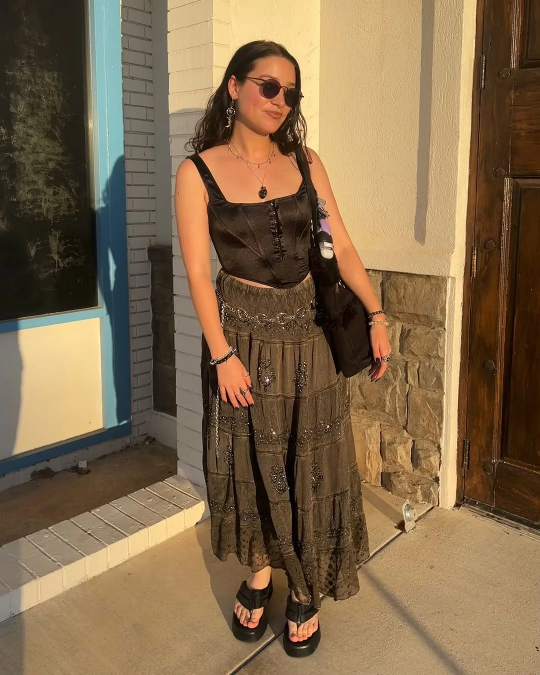 30 summer skirt outfits 2026 Black Corset Top With A Sheer Embellished Skirt