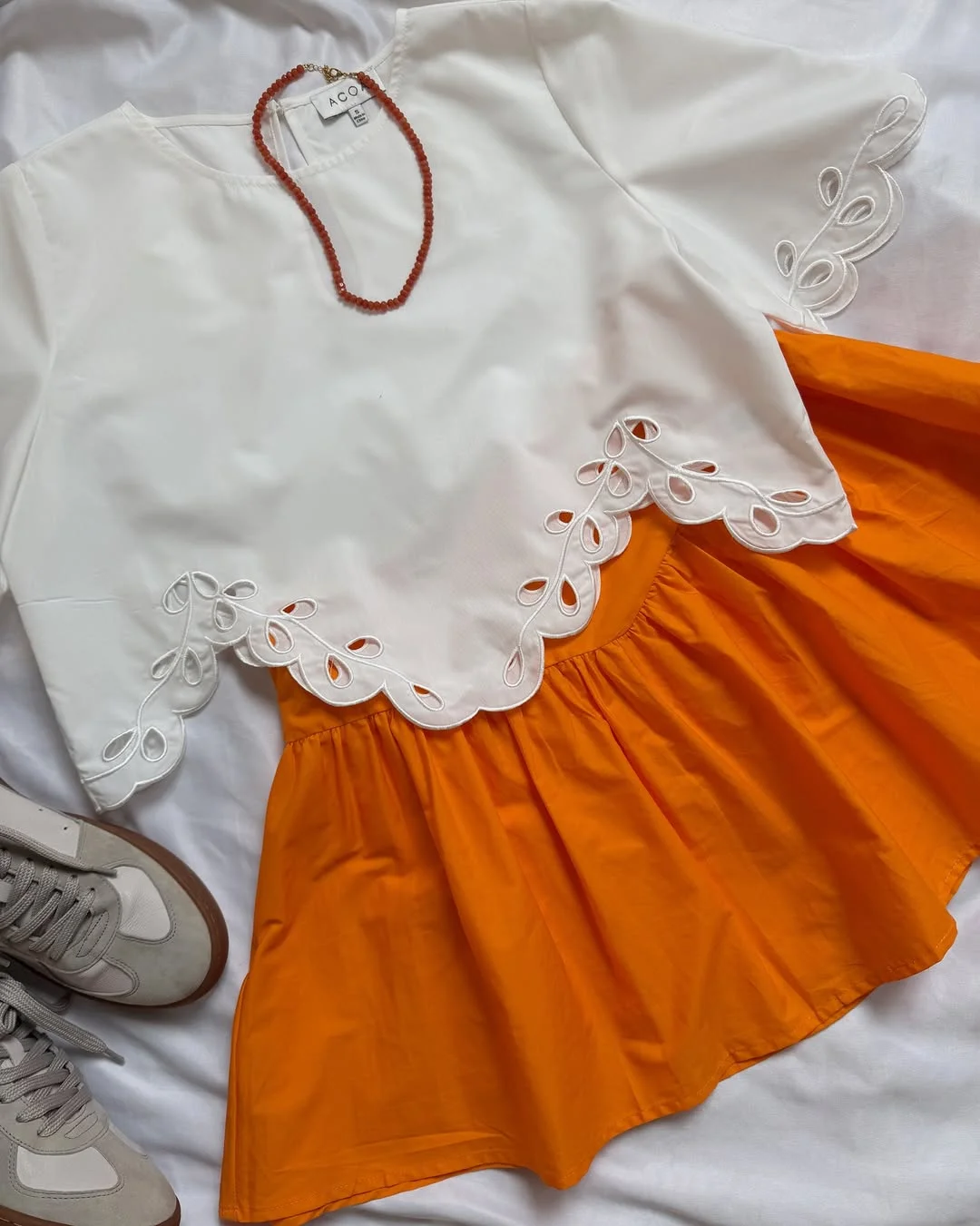 30 summer skirt outfits 2026 White Scalloped Top With A Tangerine Mini Skirt