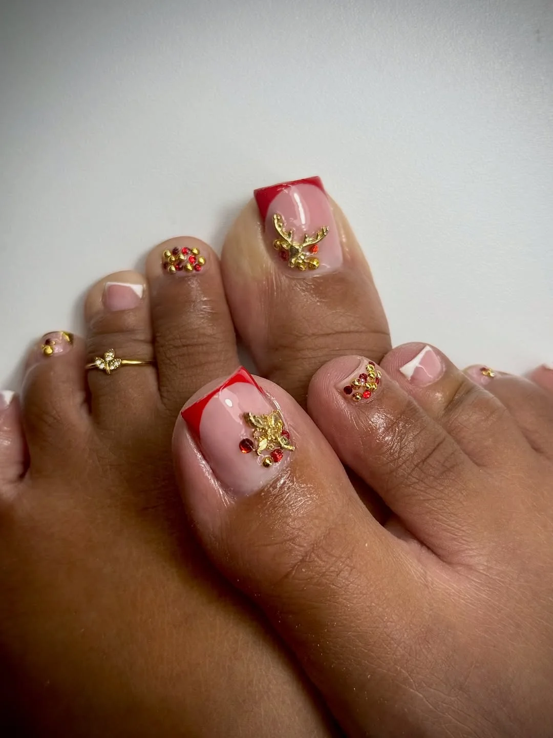 summer toe nails colors 2026 Red French Tips With Gold Summer Charms