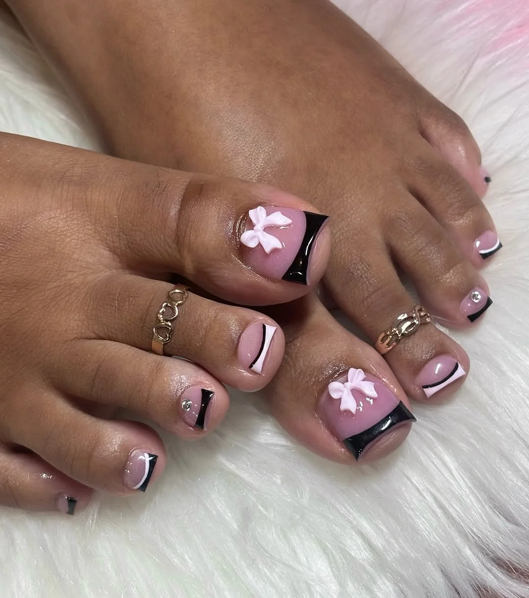 summer toe nails colors 2026 Black And White French Tips With Floral Detail
