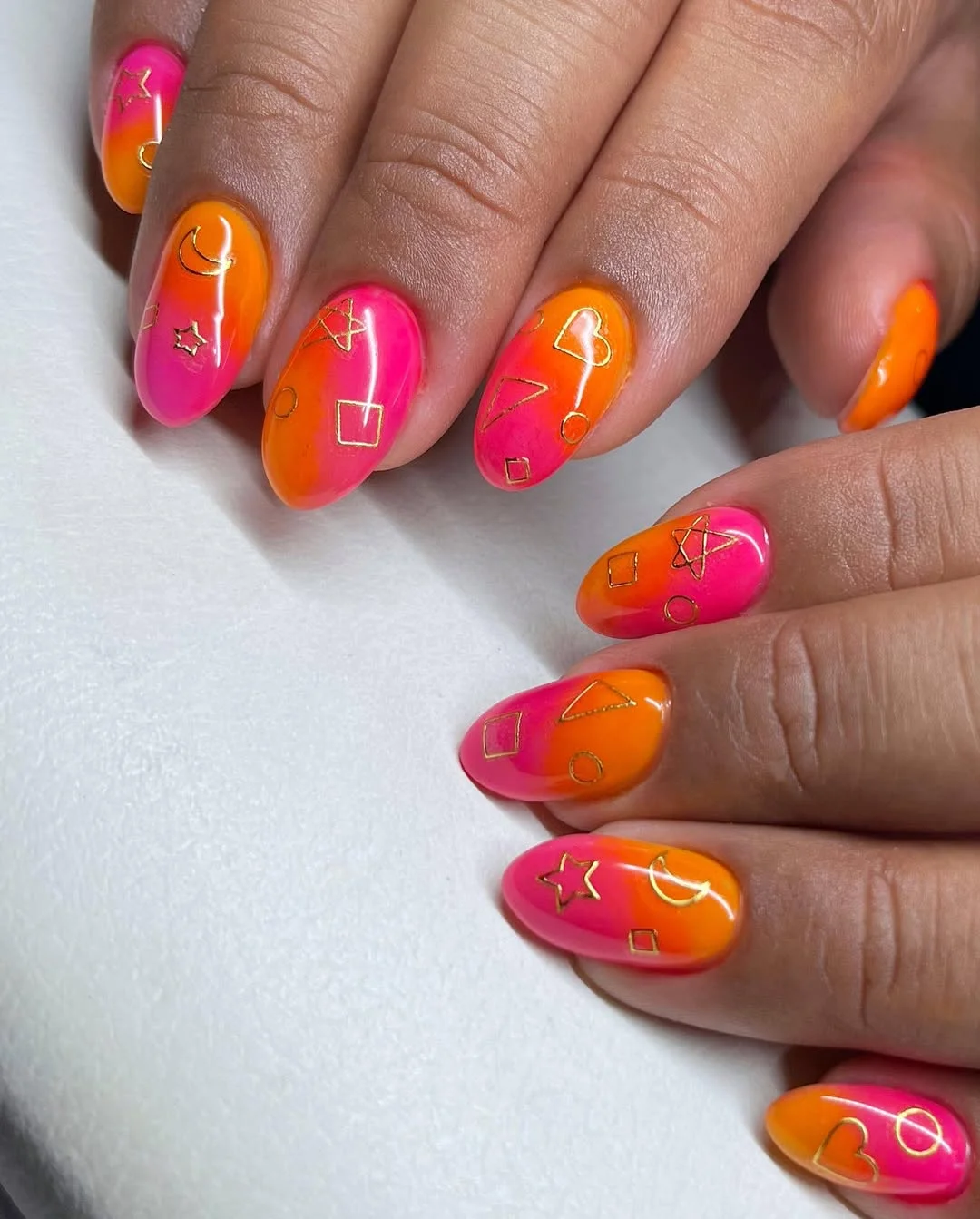 summer vacation nails 2026 Sunset Ombre Nails With Playful Gold Charms