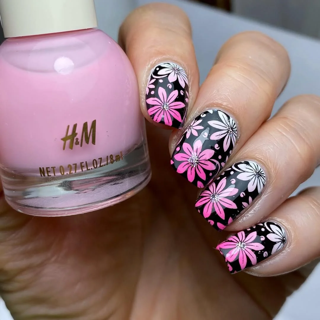 summer vacation nails 2026 Pink Floral Noir Nails for a Stylish Vacation Twist