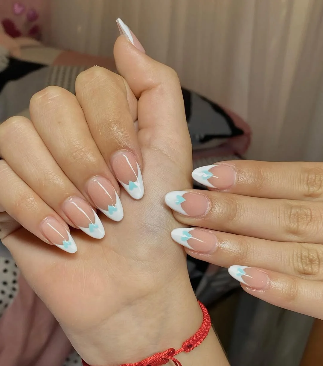 summer vacation nails 2026 Soft White French Almond Nails With a Cool Aqua Twist