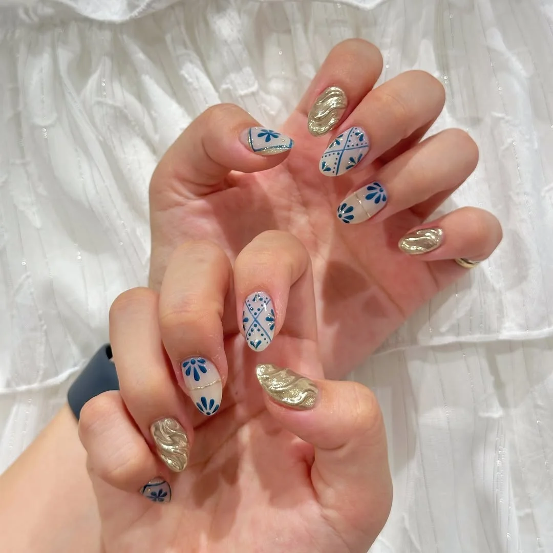 summer vacation nails 2026 Blue Tile Art and Molten Gold Vacation Nails