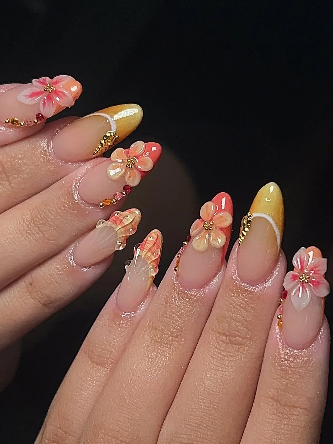 summer vacation nails 2026 Coral Yellow Floral Nails With Golden Vacation Texture