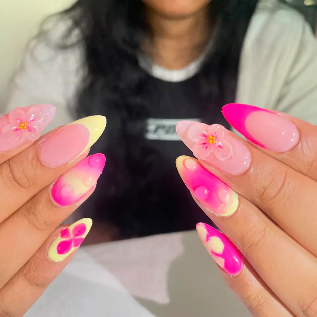 summer vibrant nails summer 2026 Hot Pink Floral Aura Nails With a Soft Neon Glow